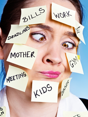 A woman looks overwhelmed with sticky notes on her face labeled bills, work, deadlines, kids, gym, and dinner, humorously illustrating mental overload and caregiver brain.
